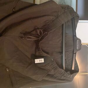 SOLD. NWT pull on pants size l. With elastic cuffs